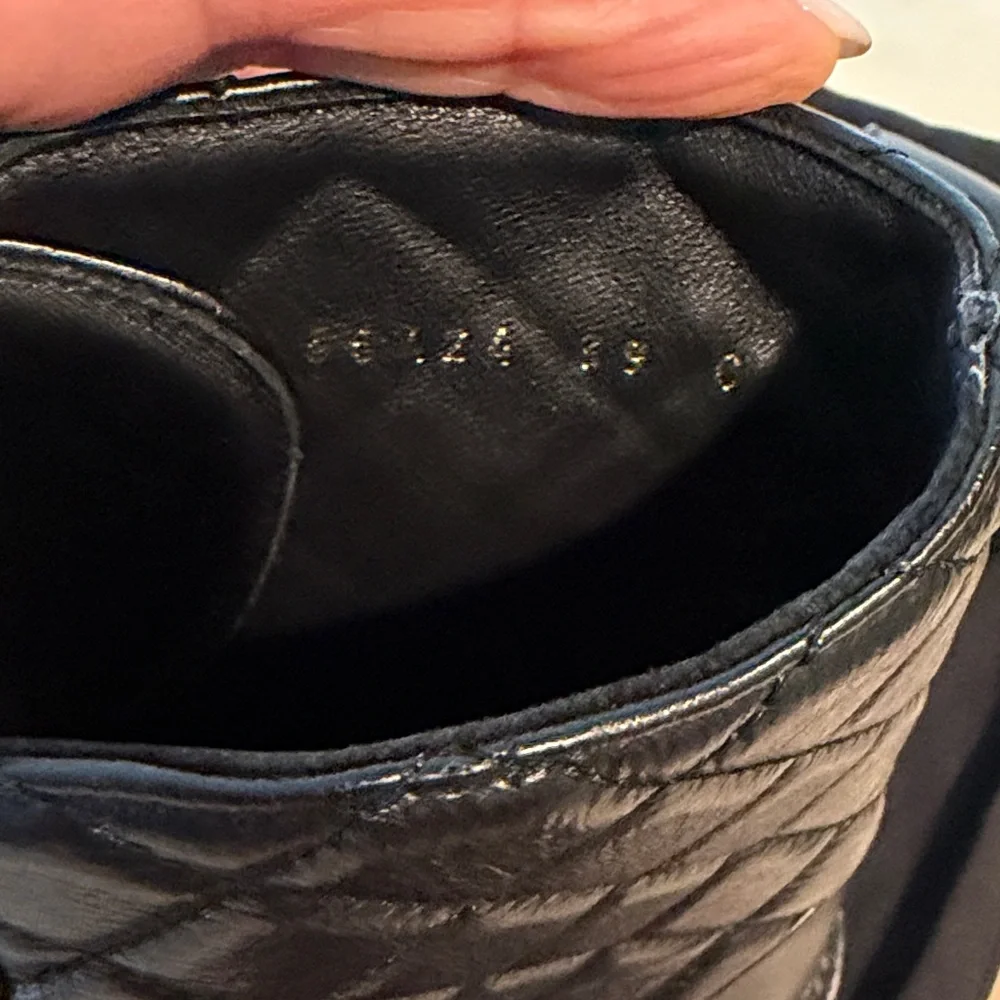CHANEL Black Quilted Lace-Up Combat Boots with Gold Hardware. Size 39